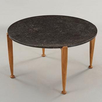 Josef Frank, a black marble top table, model 960, walnut base, Svenskt Tenn, 1950's.