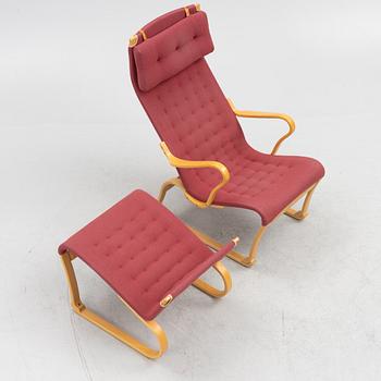 Bruno Mathsson, a 'Migo' armchair with a foot stool, Mathsson International, Värnamo.