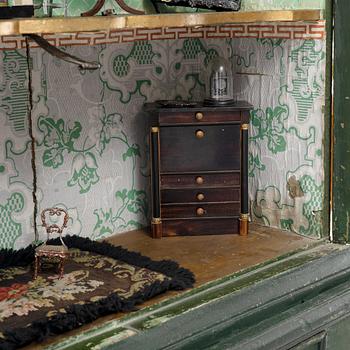 An 18th century cabinet / doll's house.
