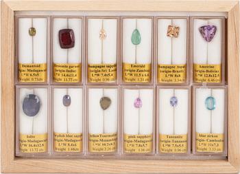 A collection of twelve gemstones.