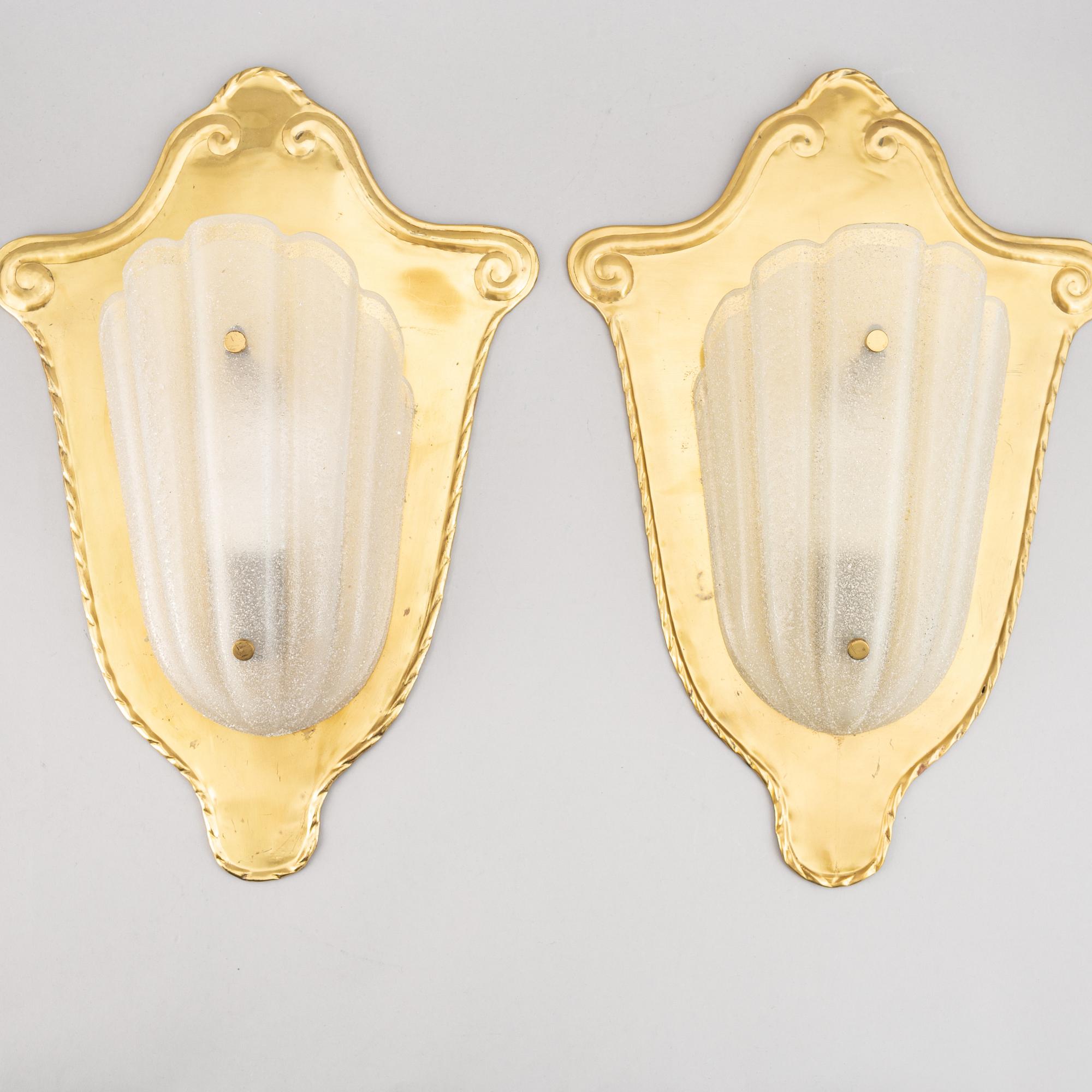 A pair of brass and glass wall lamps, 1940s.