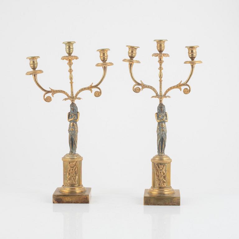 A pair of Empire style candelabra, around 1900.