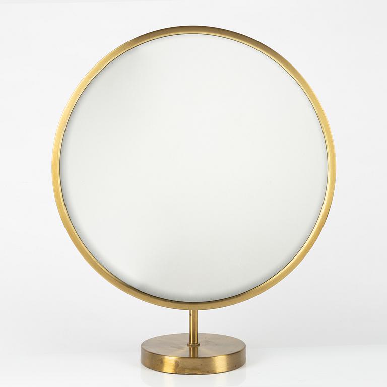 A Swedish Modern brass table mirror, 1940's/50's.