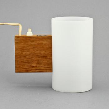 VÄGGLAMPOR, ett par, Uno och Östen Kristiansson, Luxus, 1900-talets andra hälft.