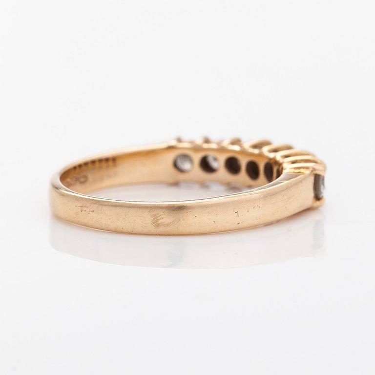 Ring, halvallians, 14K guld med briljantslipade diamanter. Finska importstämplar 1990.