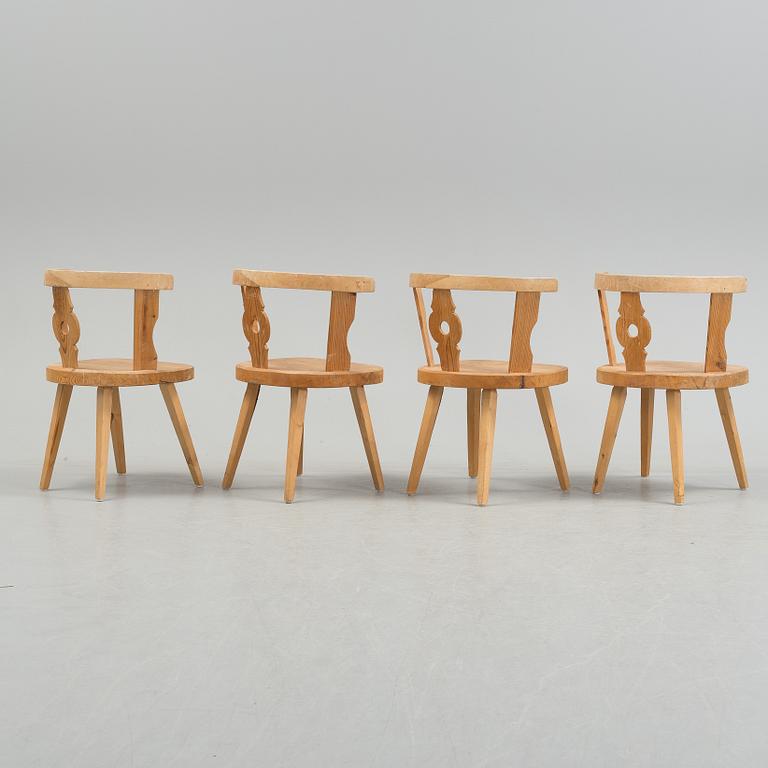 FOUR EARLY 20th CENTURY ARMCHAIRS.