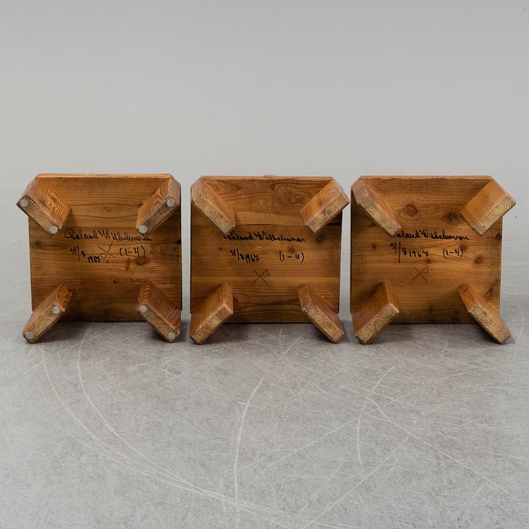 ROLAND WILHELMSSON, three pinewood stools, signed and dated 31/8 1967.