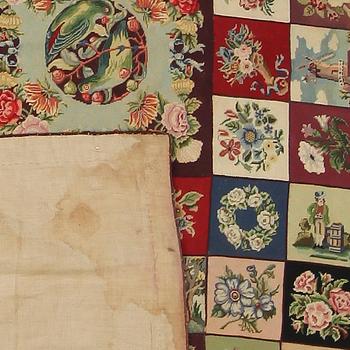 TEXTIL/MATTA, handbroderad, omkring år 1900.