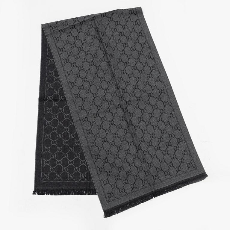 Gucci, a wool 'GG Jaquard Knitted Scarf'.