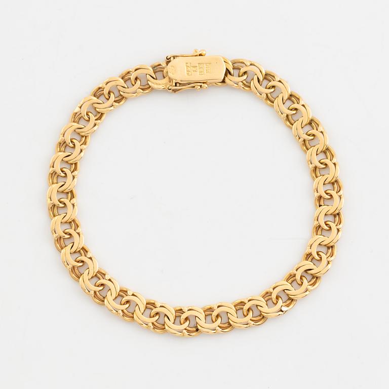 18K gold bracelet.