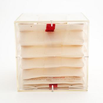 Margit Szilvitzky, a textile and plexi glass sculpture, signed and dated 1976.