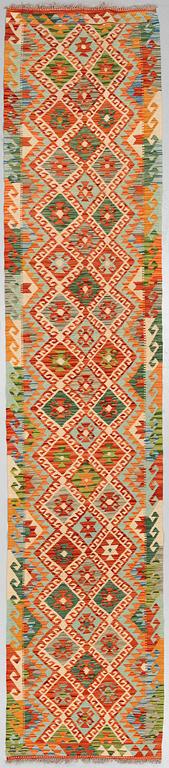 A RUNNER, kilim, around 390 x 77 cm.