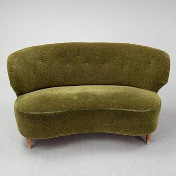 A sofa and easy chair, 1940s/50's.