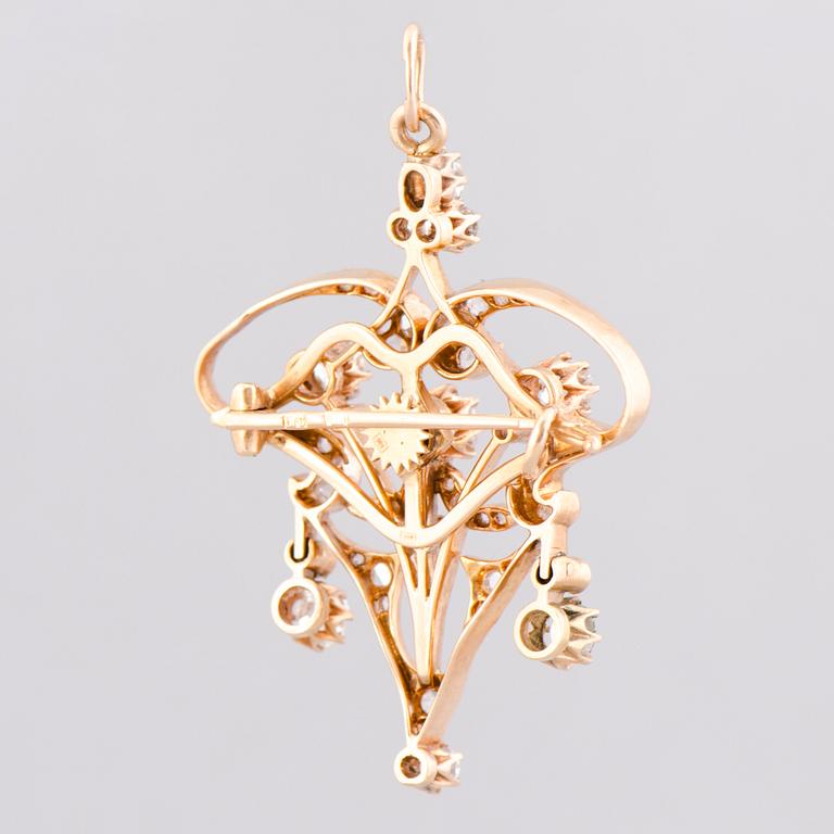 A BROOCH / PENDANT, old cut diamonds, 14K (56) gold. Russia, early 20th century.