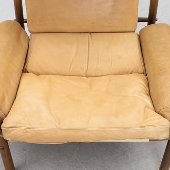 Arne Norell, Armchair with an ottoman, 'Inka', Norell Möbel AB, 1970s.