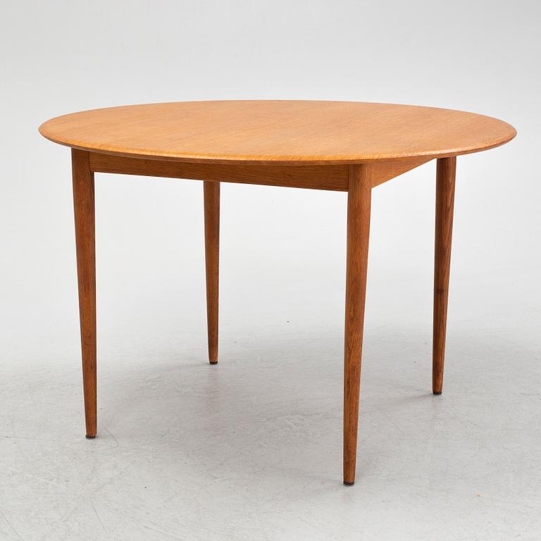 A Scandinavian dining table, 1950's/60's.