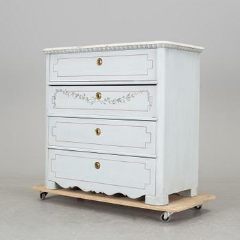 A mid 19th century chest of four drawers.