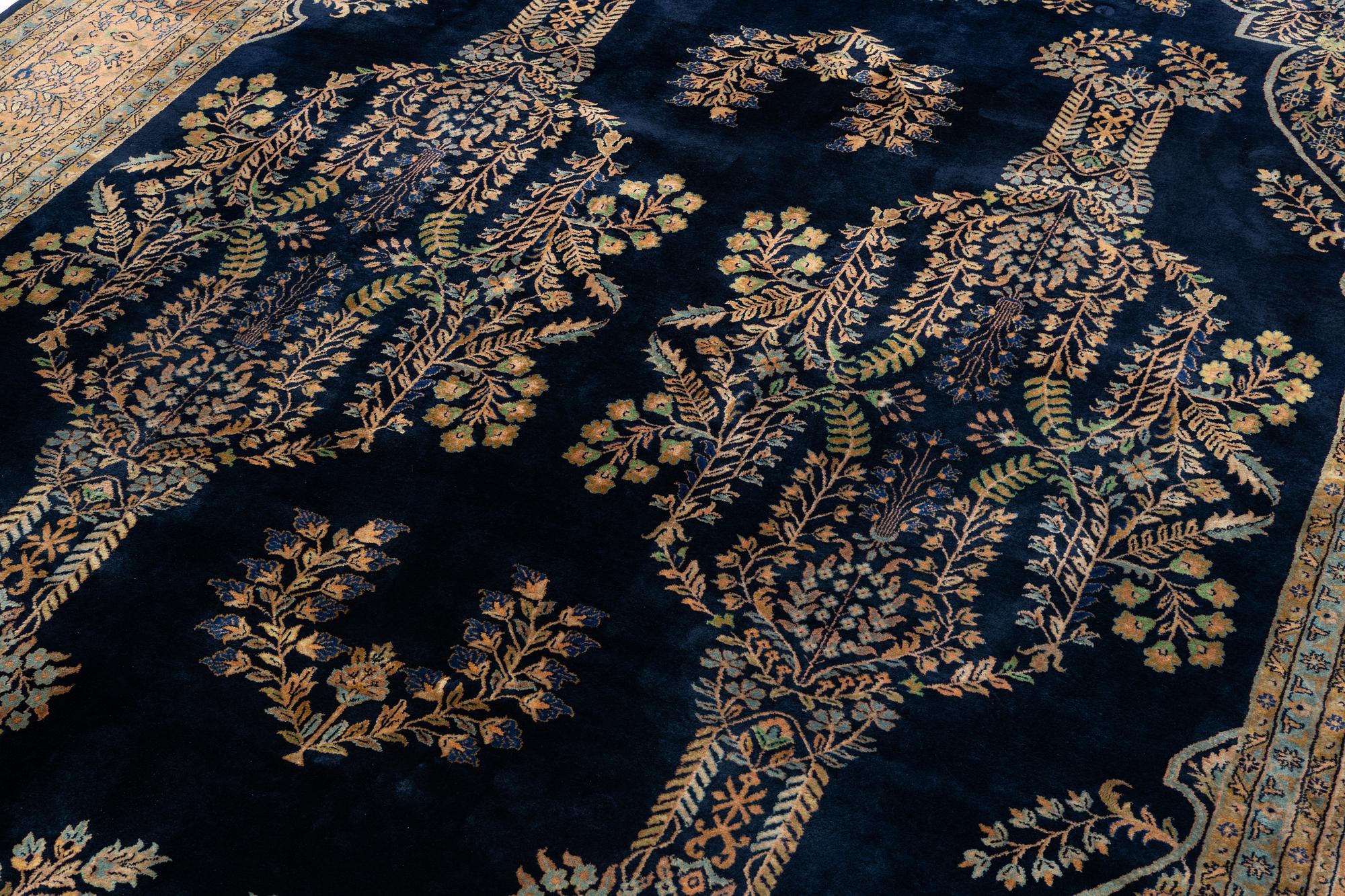 An India Carpet, c. 380 x 285 cm.