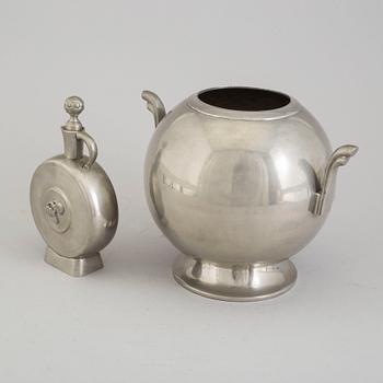 A 1930´s pewter vase and bottle.