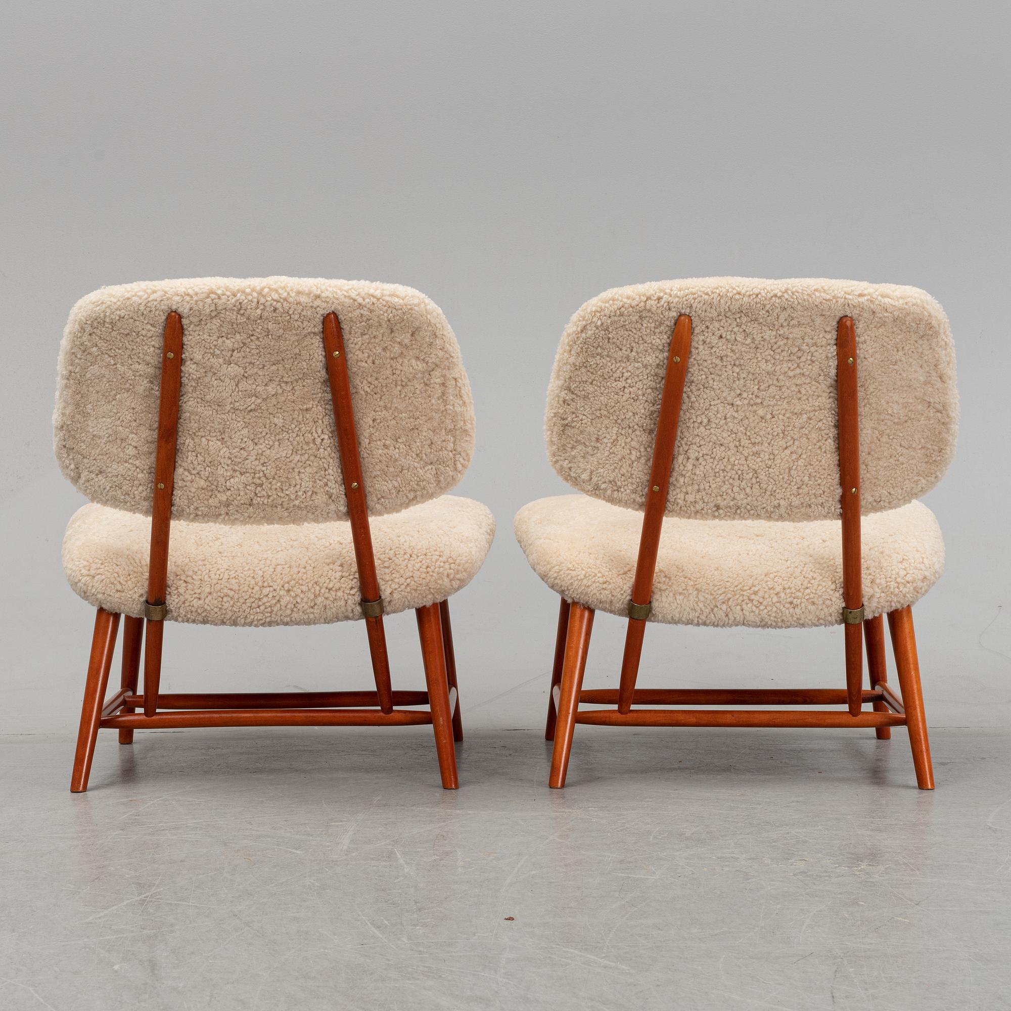 A 1950's pair of 'TeVe' easy chairs by Alf Svensson.