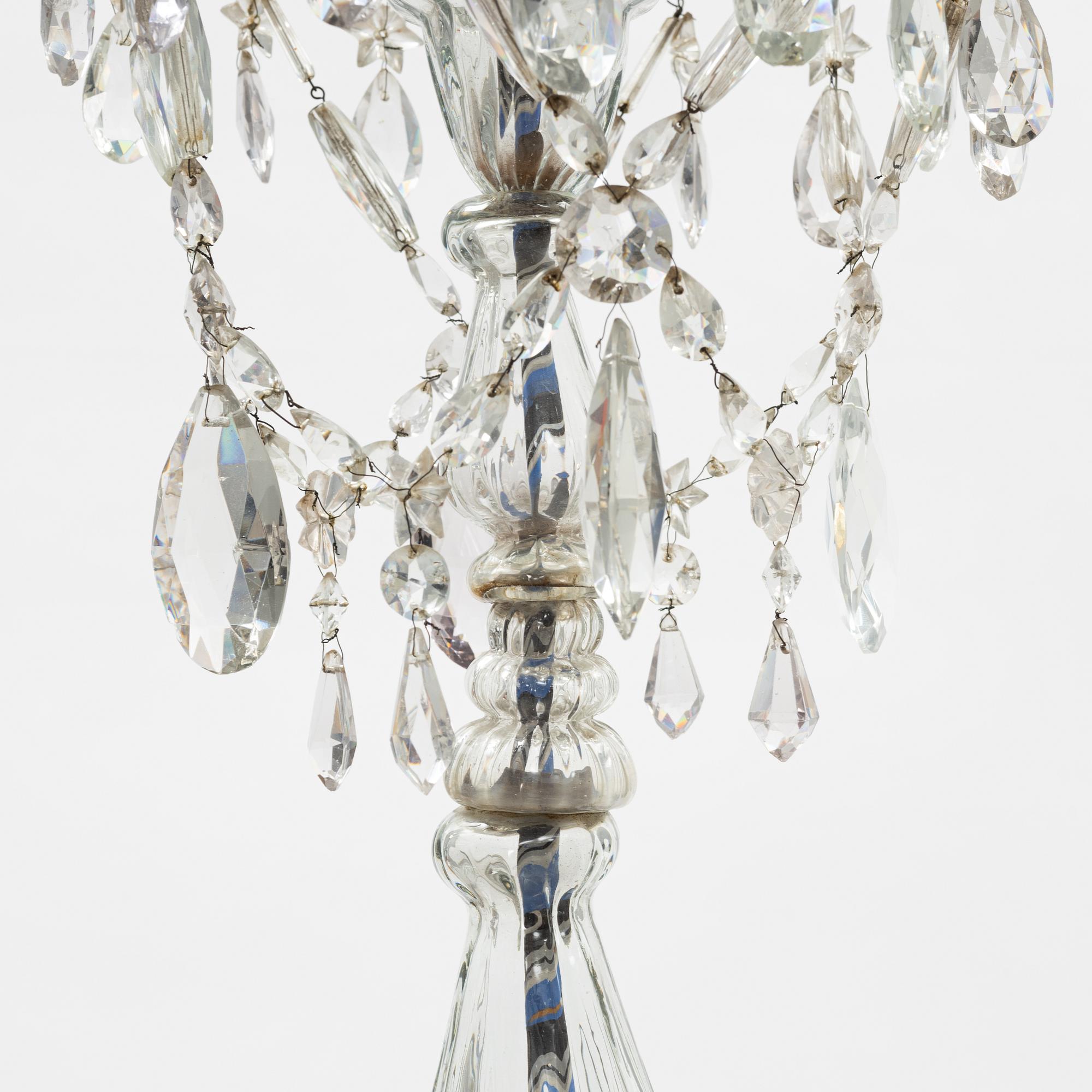 A European glass three-light chandelier, circa 1800.