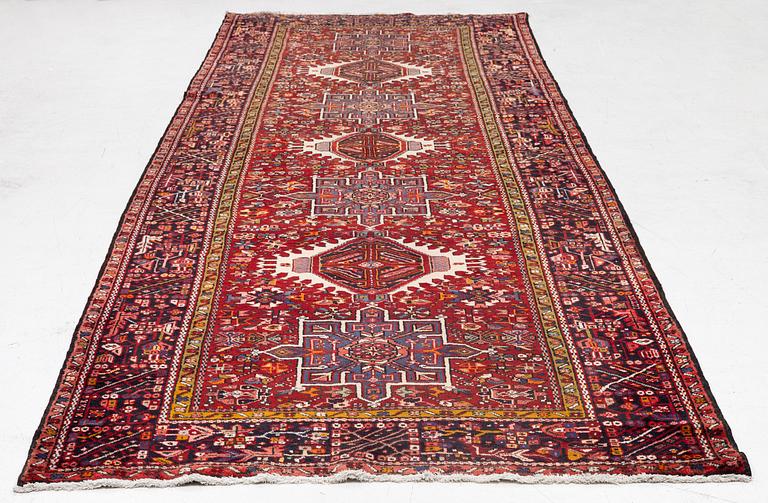 A semi-antique Karadja runner, c. 405 x 155 cm.