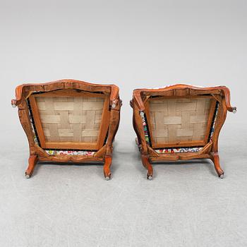 Two 18th century French Louis XV walnut armchairs.