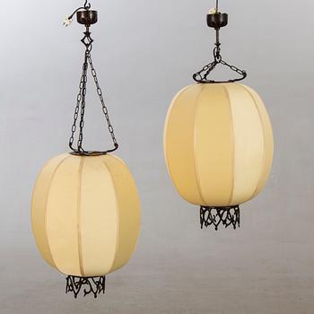 A pair of Chinese 20th century ceiling lamps.