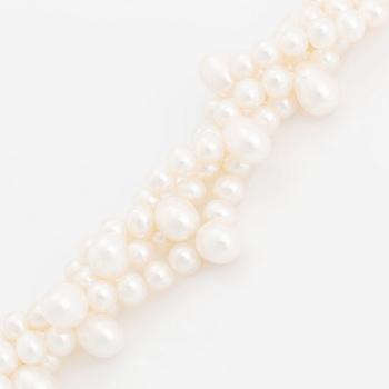 A cultured freshwater pearl necklace and bracelet.