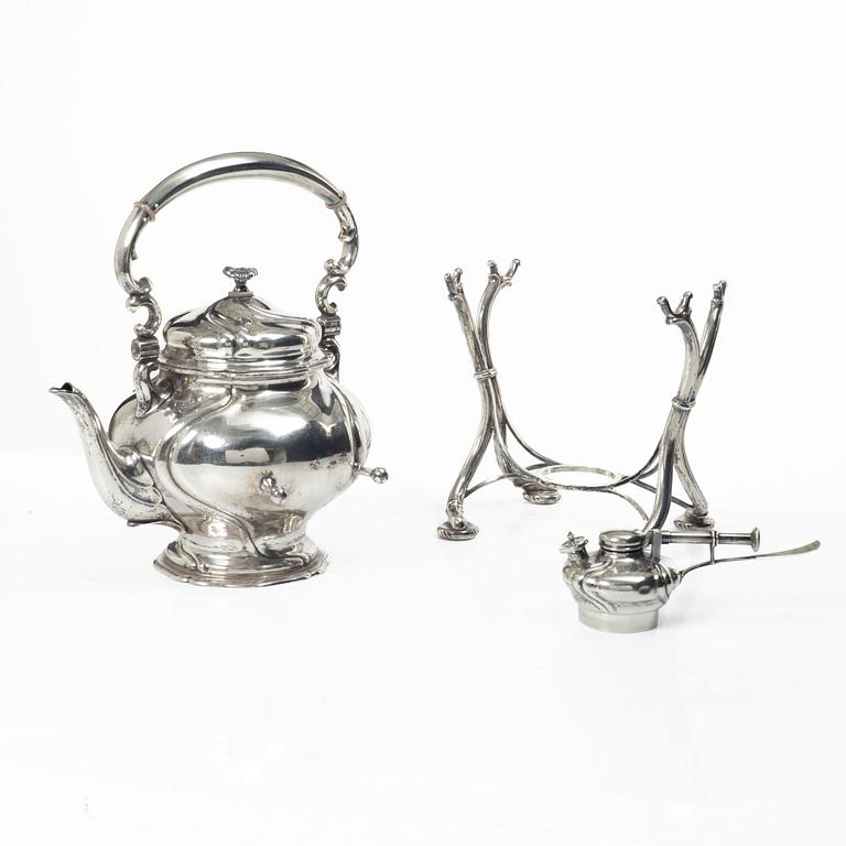 Silver teapot on a réchaud, Rococo style, Swedish import mark CF Carlman, Stockholm 1916.
