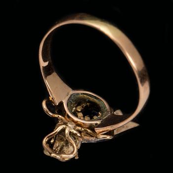 RING, 18 guld samt troligtvis paltina med rosenstenar samt blå sten. Vikt ca 2,5 g.