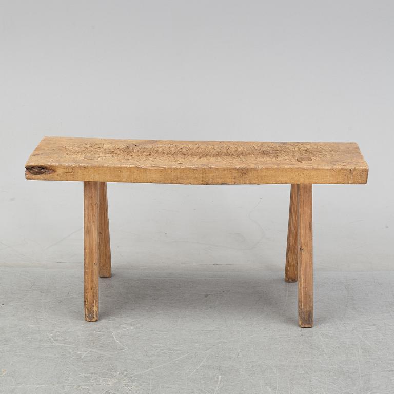A pine bench, 19th Century.