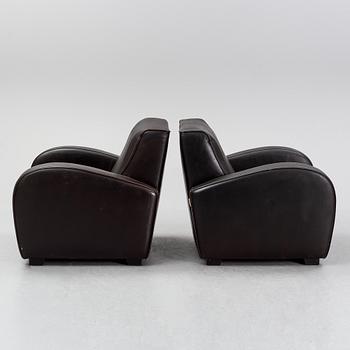 A pair of Italian leather armchairs from  Industria Divani e Poltrone, 21st-century.