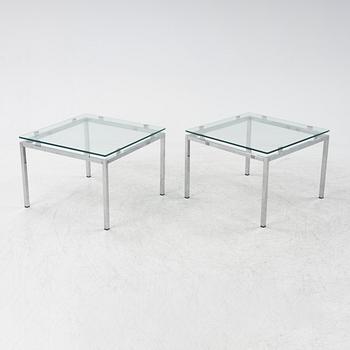 A pair of 1980's glass top side tables.