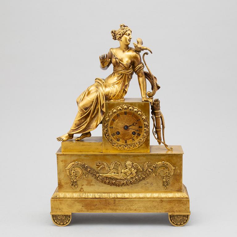 An empire bronze mantle clock, first half of the 19th century.