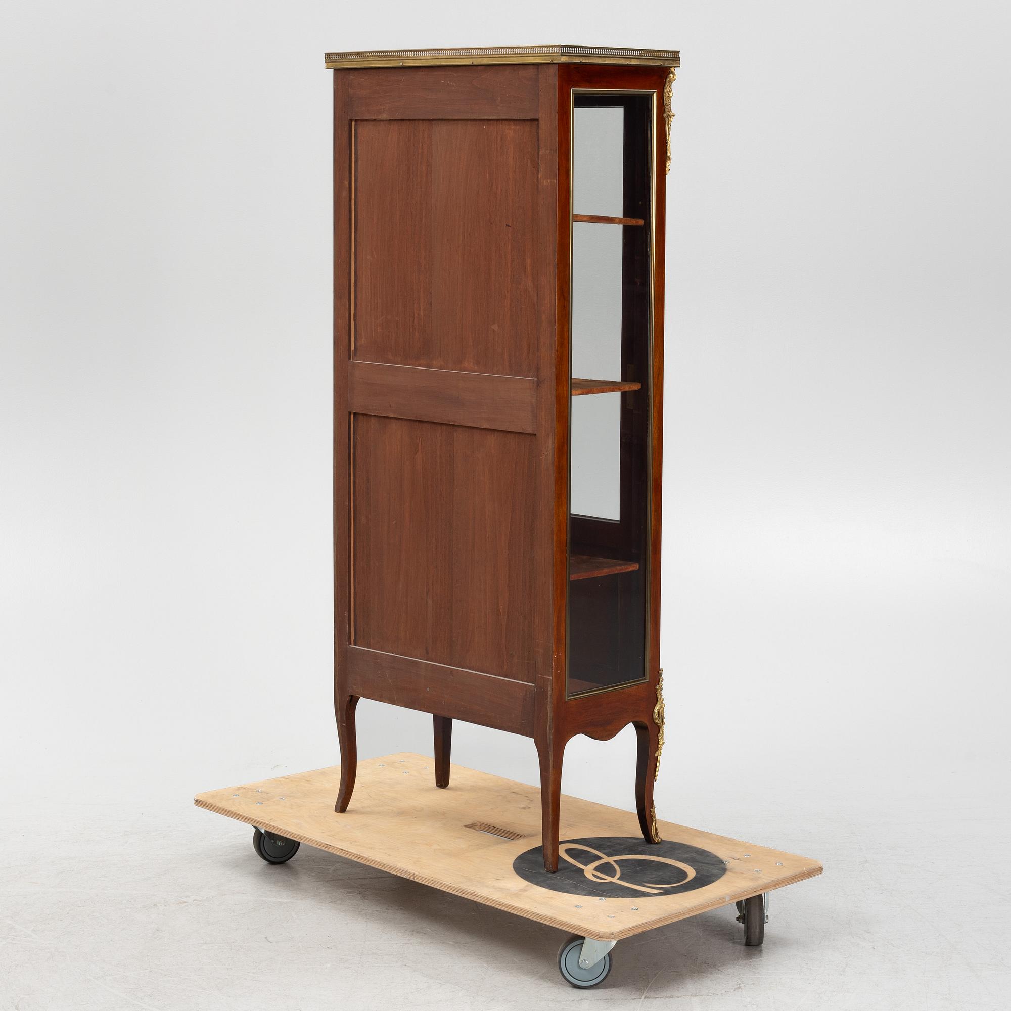 A Louis XVI style display cabinet, first part of the 20th Century.