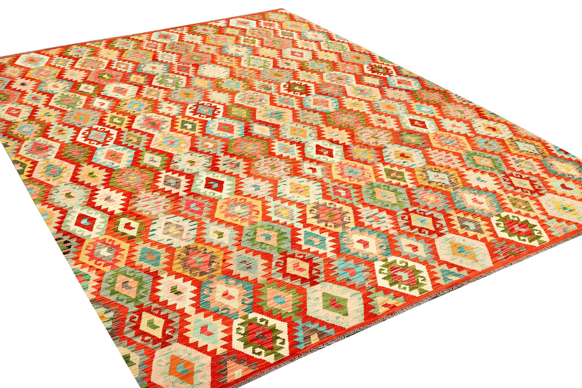 A Kilim carpet, c. 396 x 307 cm.
