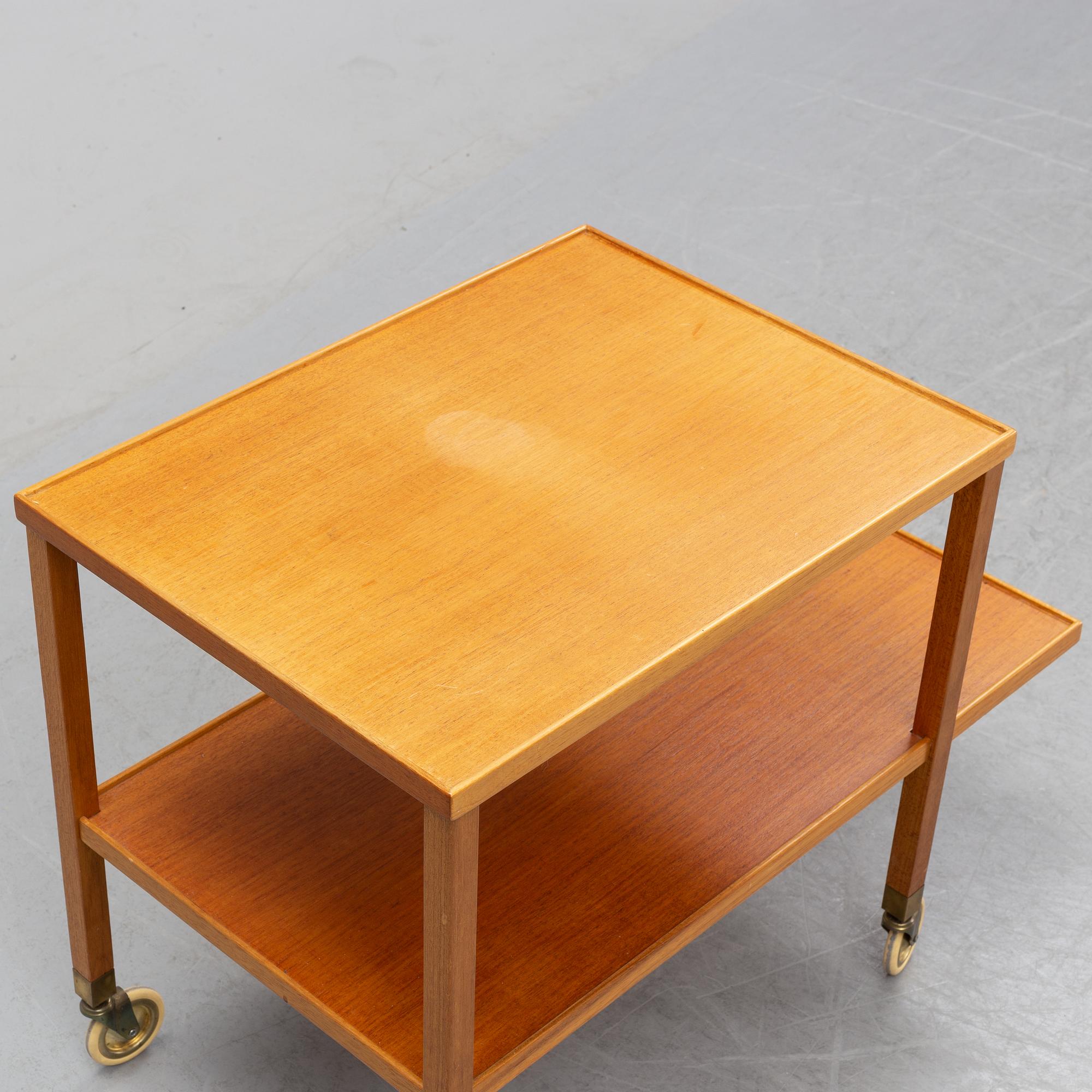 A model 470 mahogany tea trolley by Josef Frank for Firma Svenskt Tenn, designed 1932.