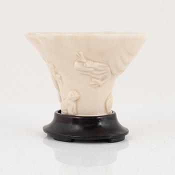 A blanc de chine libation cup, Qing dynasty.