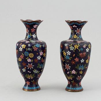 A pair of cloisonne vases, Japan, early 20th Century. And a Chinese cloionne box with cover.