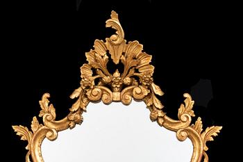 An mid 20th century Louis XV-style mirror from Paoletti, Firenze Italy.