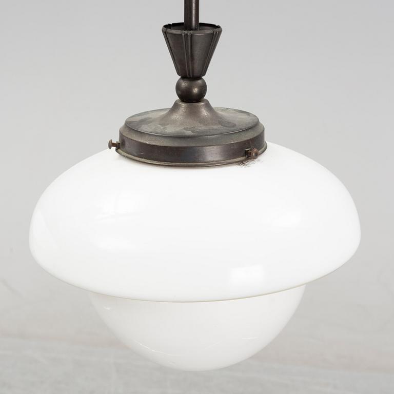 A pair of glass and patinated brass ceiling lights, Asea, 1930's.