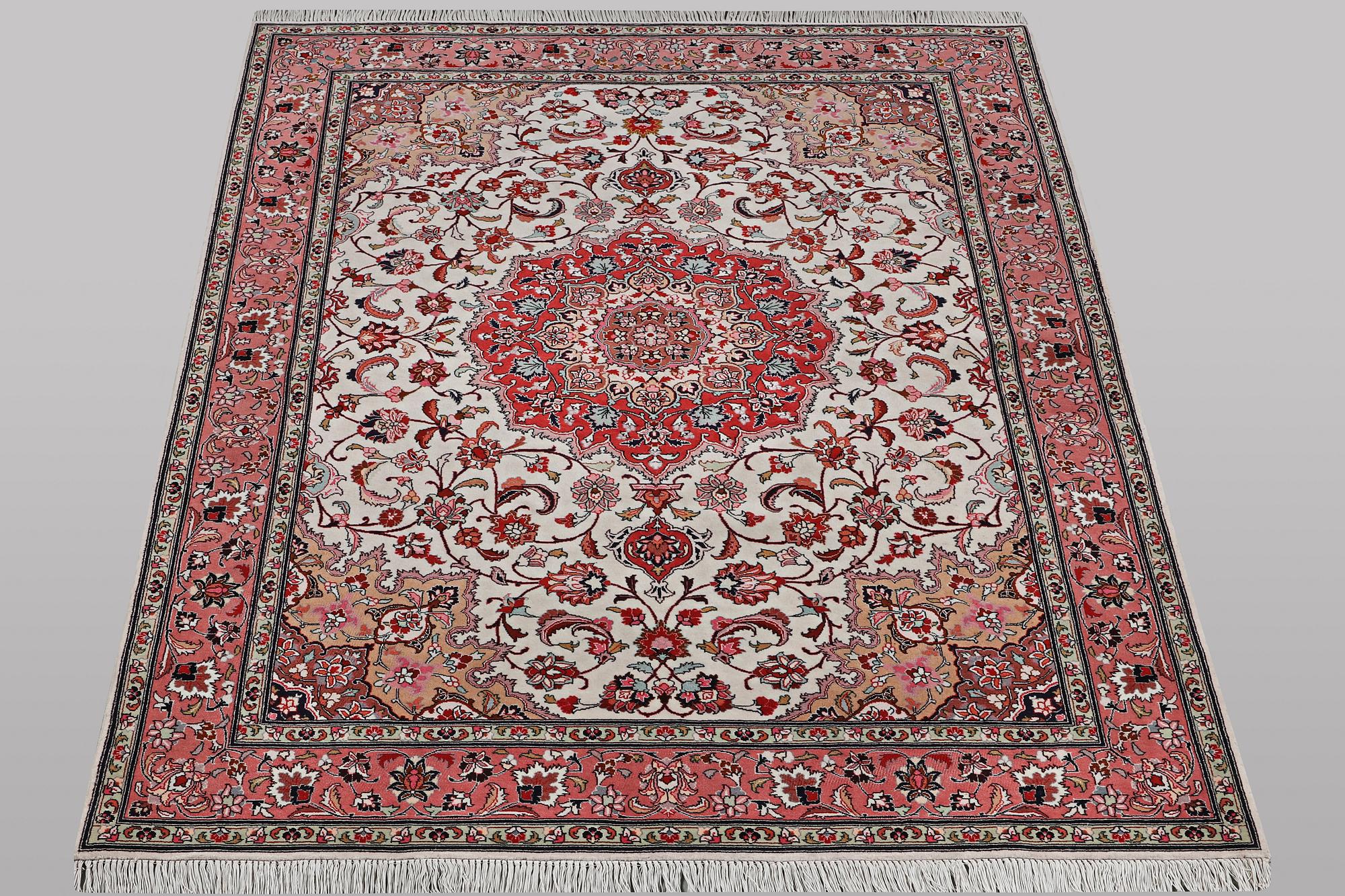A rug, Tabriz, part silk, 50 Raj, ca 210 x 158 cm.