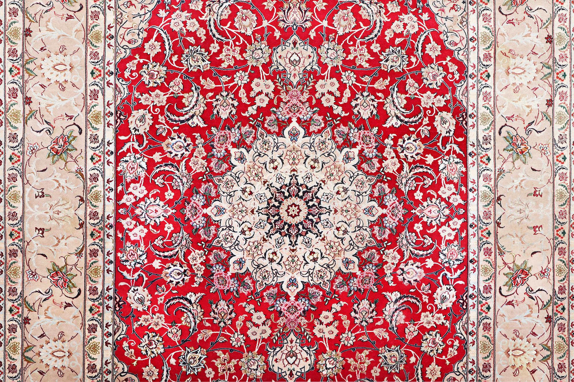 An Esfahan carpet with silk warp, c. 298 x 206 cm.
