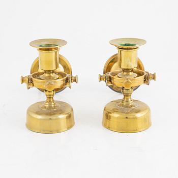A pair of maritime candleholders, 20th century.