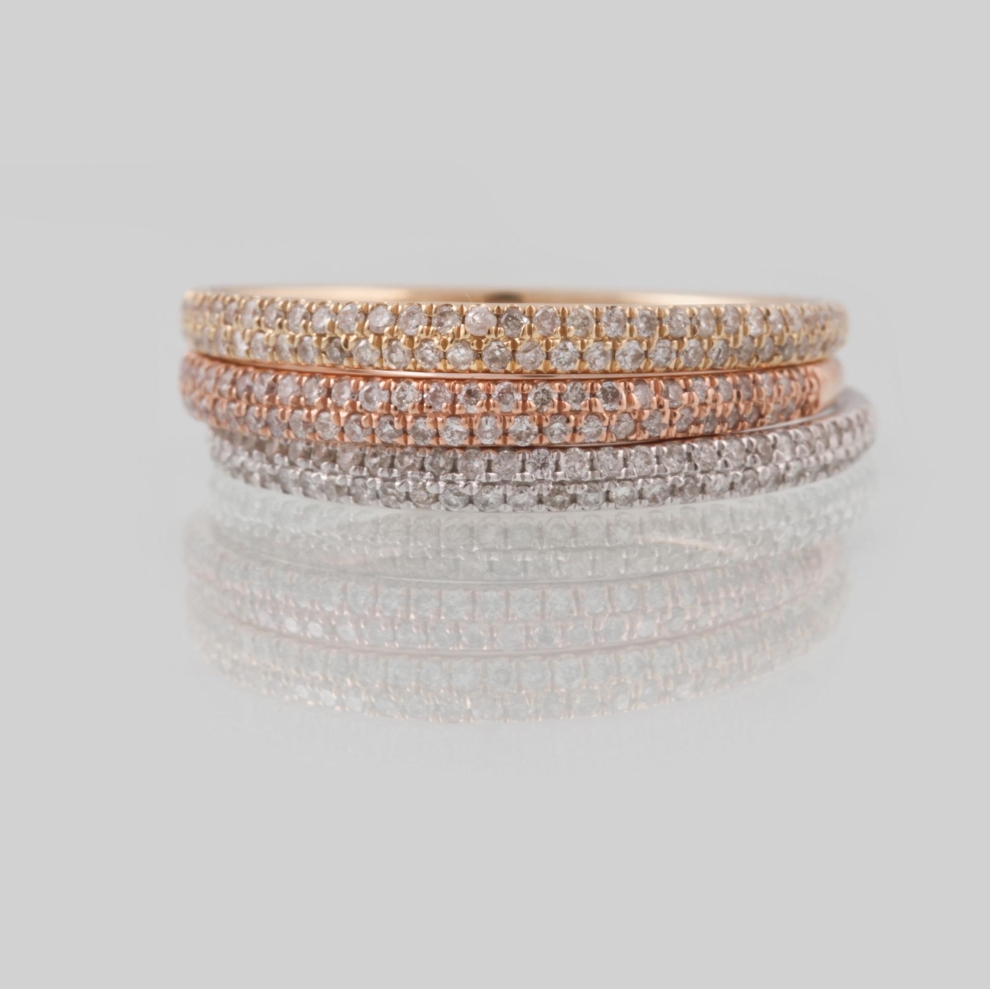 RINGAR, 3 st, 14K trefärgat guld med briljantslipade diamanter totalt ca 0.54 ct. Vikt 3,4 gram.