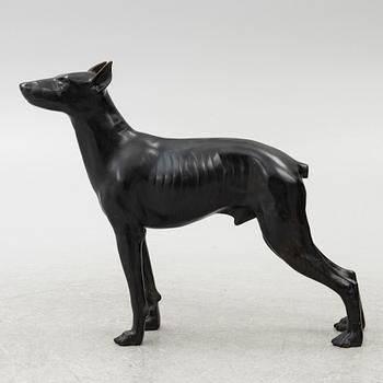 A decorative sculpture of a dog, 20th/21st century.