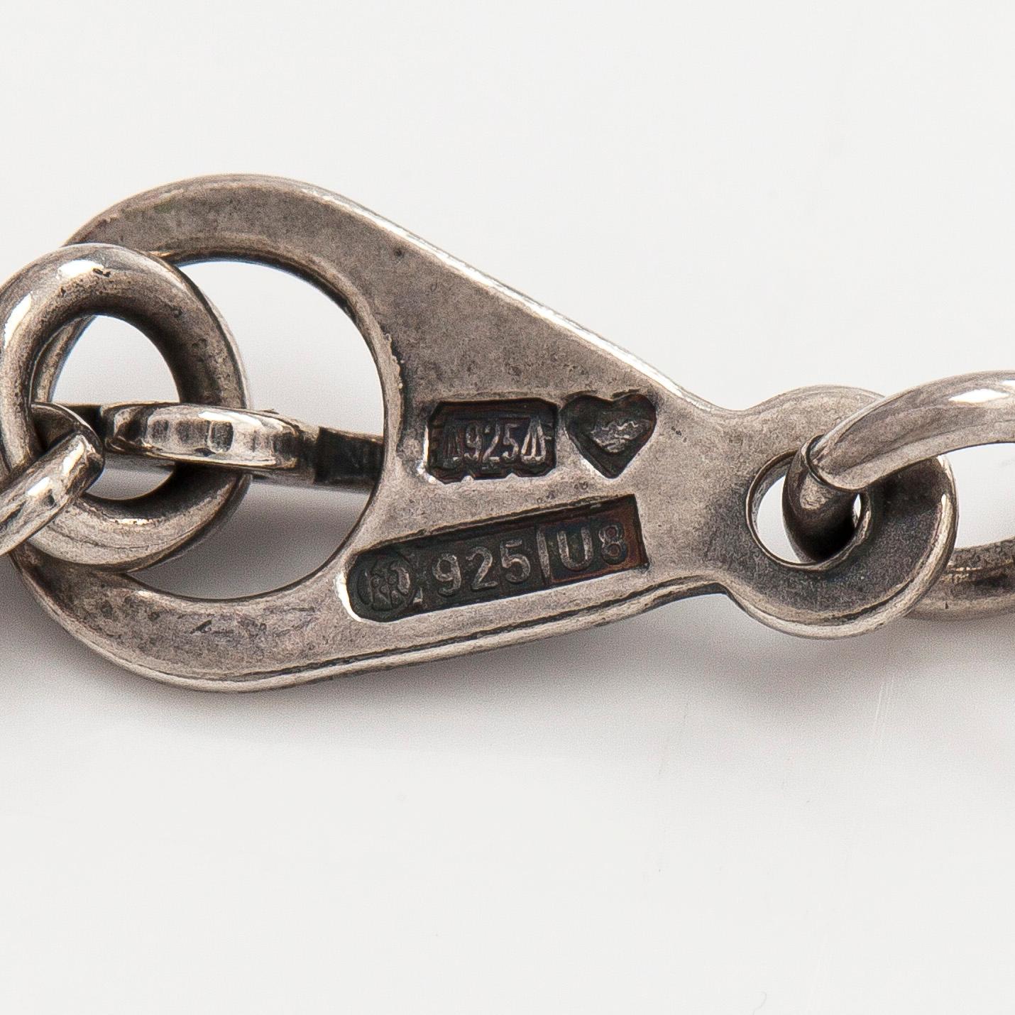 Kalevala Koru, a sterling silver 'Paradise/Hämäläisemännän juhlakääty' necklace. Helsinki 1997.