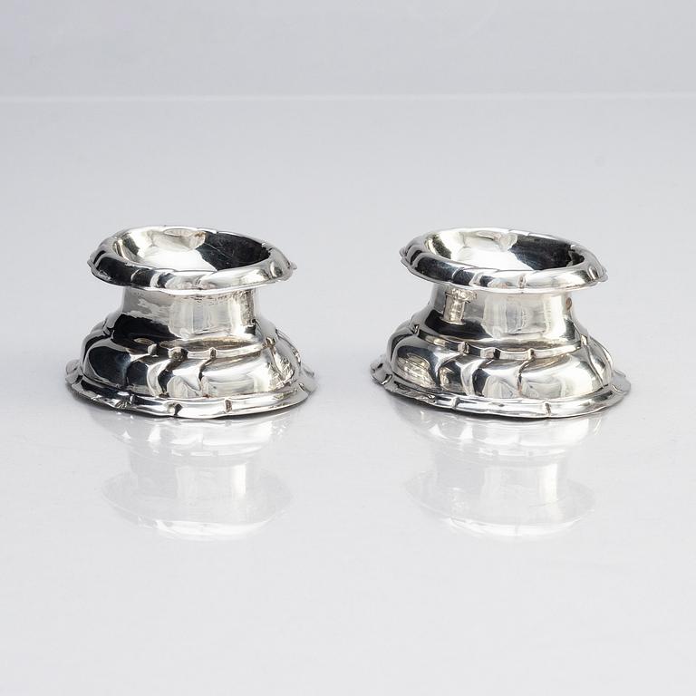 A pair of European Rococo 18th century silver salt-cellars.