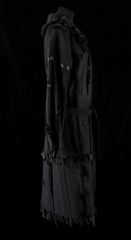 A black coat by Gucci.
